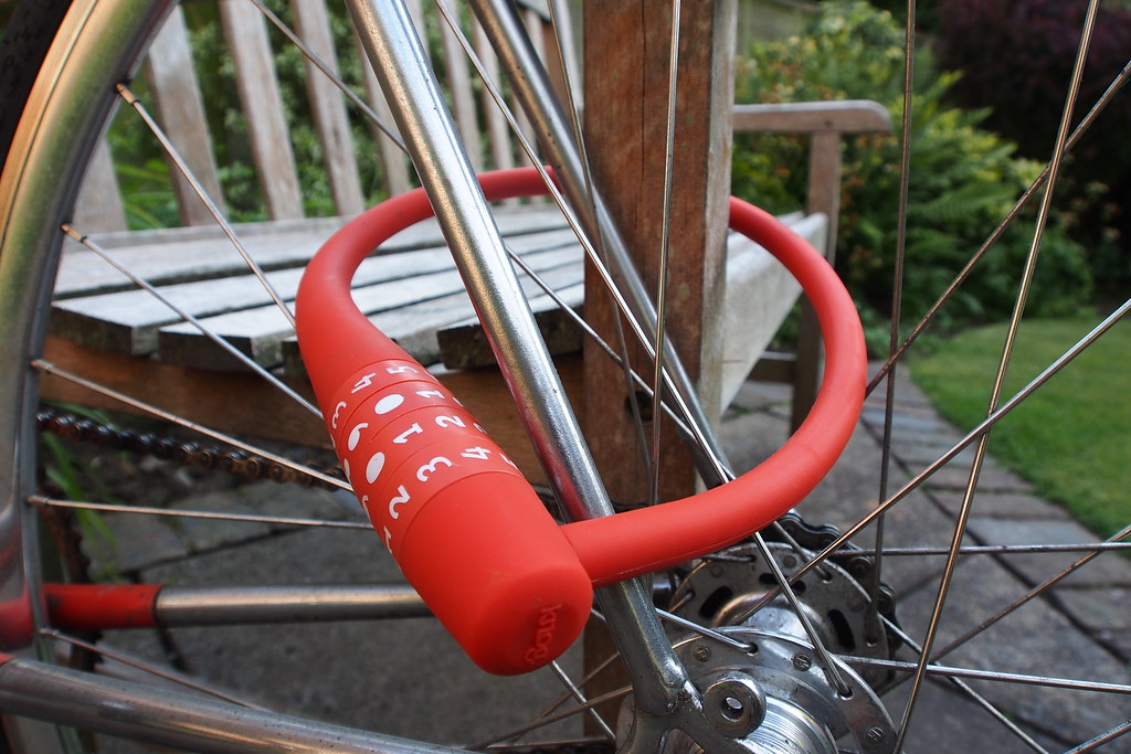 Red bike lock with combination of numbers.